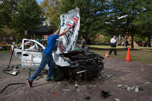 Participating marshall students relieved some midterm stress at the Car Bash on Buskirk Field, October 13, 2016,