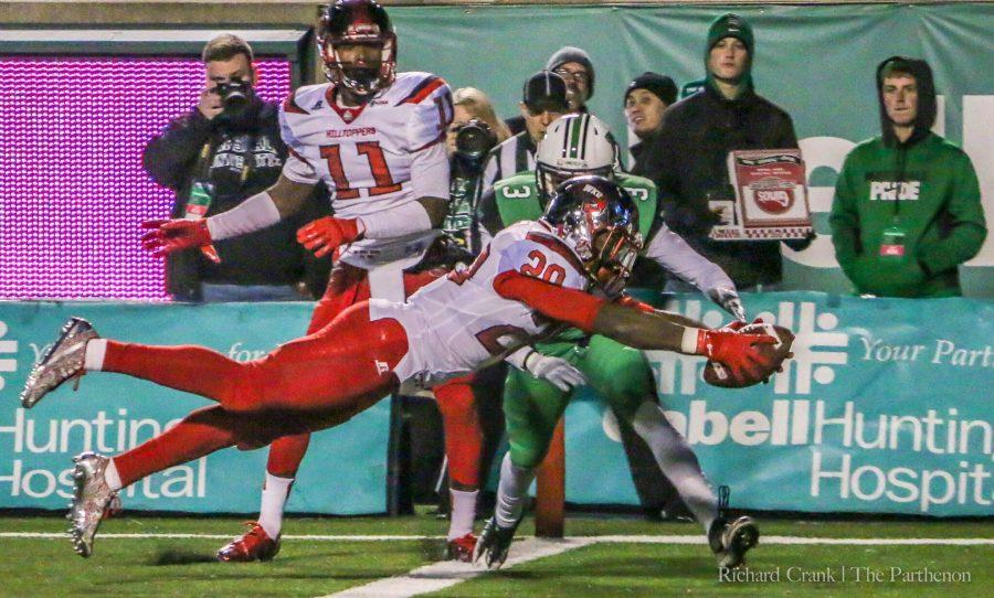 Western Kentucky running back Anthony Wales dives for the end zone in Saturday's lopsided 60-6 loss to the Hilltoppers. The loss is the worst home loss in Joan C. Edwards stadium history.