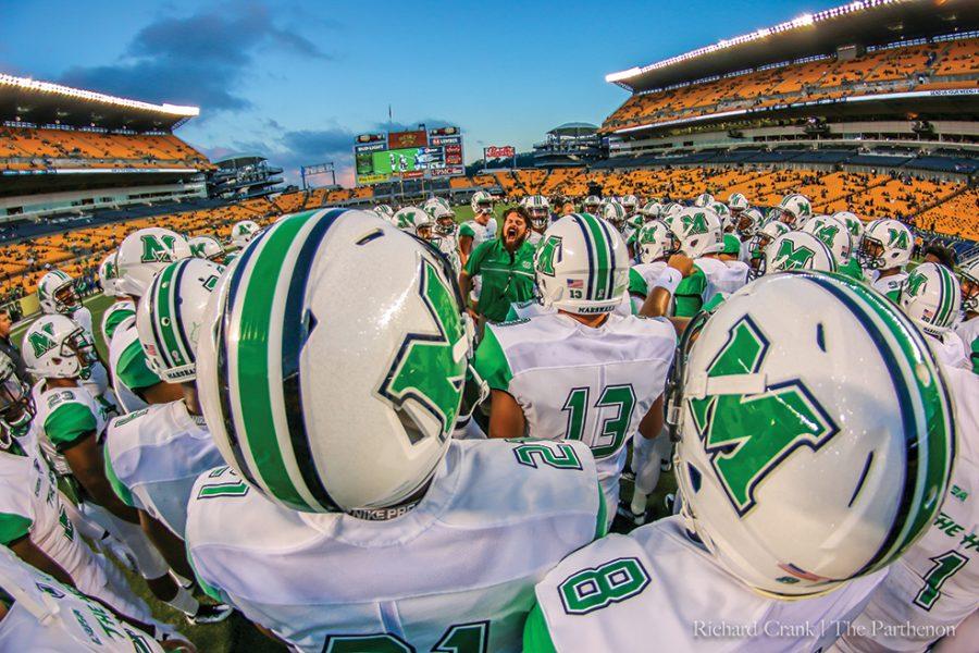 The Marshall football team takes the field ahead of their game with the Pittsburgh Panthers. Marshall ultimately lost the game 41-27, their second loss of the season to an ACC school.