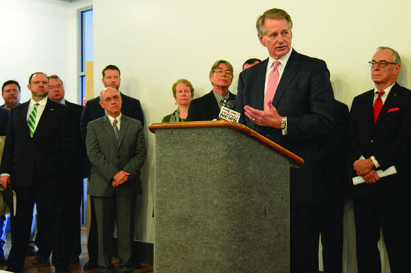 Mayor Steve Williams addresses city issues to a crowd at a press conference Monday.