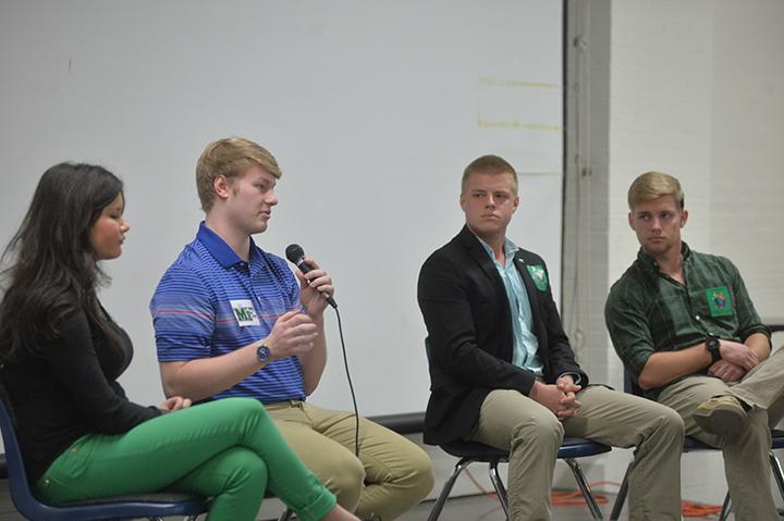 Student body president Matt Jarvis responds to questions from moderator Tom Jenkins on stage with the other student government candidates during the second SGA Debate Monday, March 13, 2017 inside the Memorial Student Center.