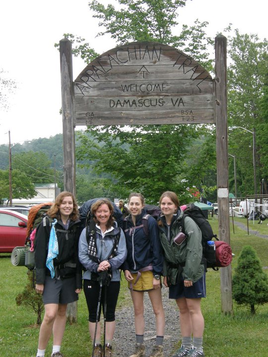 FROM LEFT TO RIGHT:
Rachel Sparkman, Kristi Fondren, Lindsay Heinemann and Meghan Arnold gather at a trail head in Damascus, Virginia, the site of Trail Days. Trail Days features a variety of activities for those interested in the Trail, including parades, talent shows and free nightly outdoor concerts.