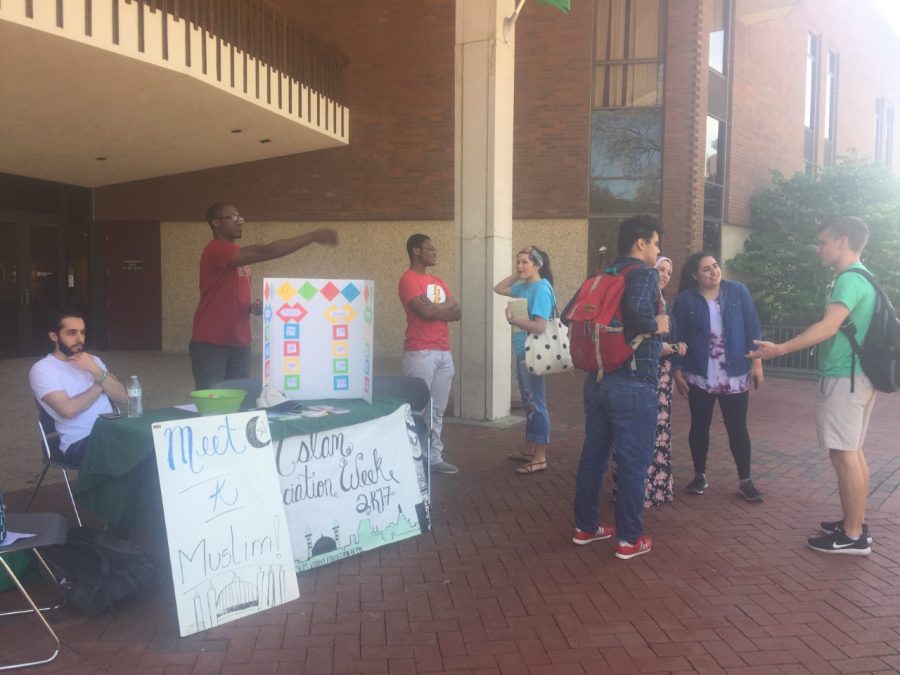 Students gather outside the Marshall Student Center to inform students about the events coming up during Muslim appreciation week.
