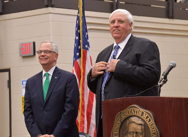 Marshall President Jerome Gilbert (left) and Gov. Jim Justice attend Justice’s “Save Our State” event at Marshall’s Arthur Weisburg Family Applied Engineering Complex March 16. Gilbert and Justice both addressed education and opportunities for young people in 
West Virginia. (Rick Haye | University Communications)