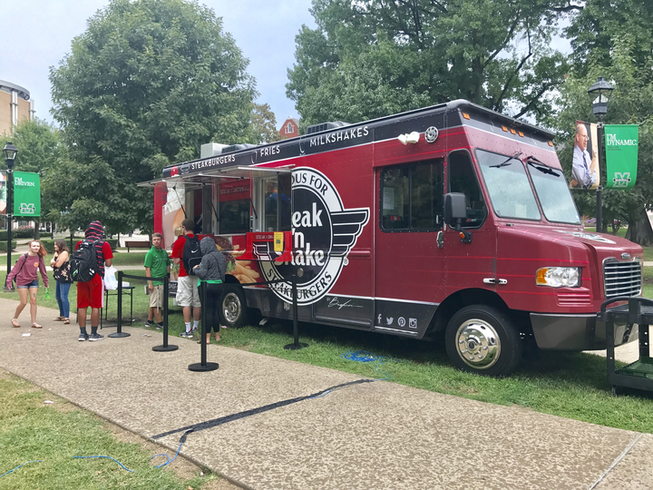 Students lining up to Steak and Shake’s food truck window to order a quick lunch in between classes.