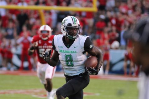 Herd narrowly behind NC State at halftime (23-20)