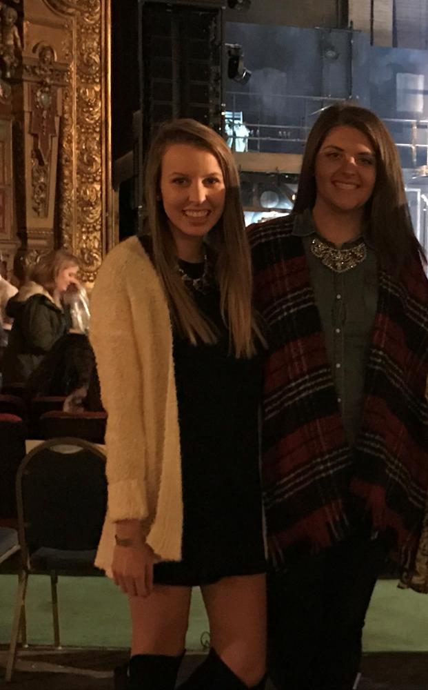 Sophomore Emma Ellis and junior Madison Davis enjoy a concert together at the Keith Albee in downtown Huntington.