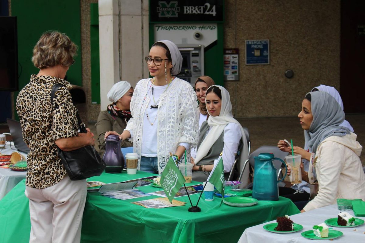 The Saudi Arabia Students Association celebrates Saudi Arabia National Day on the Memorial Student Center plaza Thursday, bringing cake, arabic coffee and cultural discussion to Marshall’s campus. Saudi Arabia National Day celebrates the founding of Saudi Arabia in 1932. This was the fifth year the Marshall organization has held the celebration.