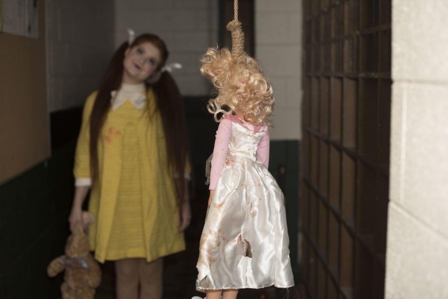 Volunteer Rachel Mullen frightened guests as a possessed doll during last year’s haunted house.