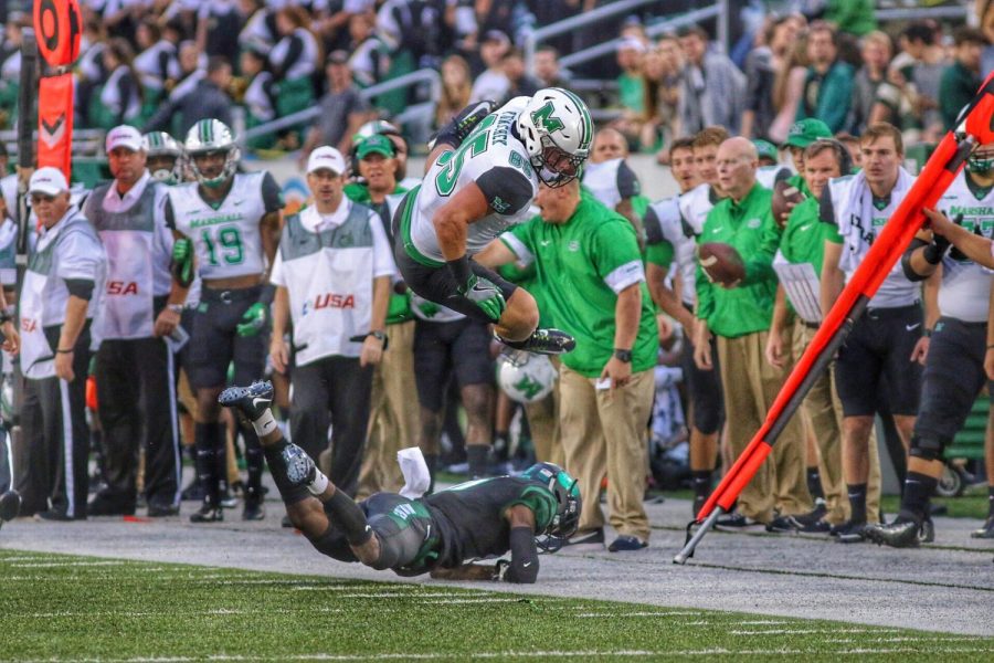 Ryan Yurachek leaps in the air after catching one of his three first half receptions. He now has a 34-game reception streak.