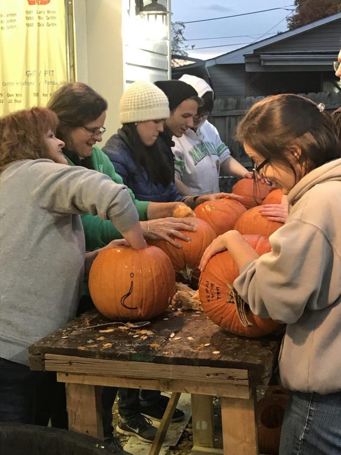 Members of the Thundering Nerds carve one large Sodoku puzzle into pumpkins that are on display at the Pumpkin House. The club has challenged local middle and high school students to solve the puzzle over the course of the Pumpkin House’s display.