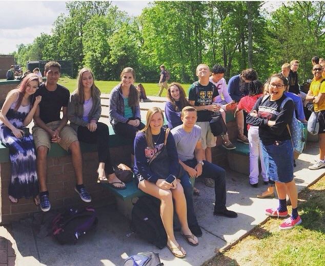 Franklin on his last day of high school, sitting outside at lunch with his friends for the last time.