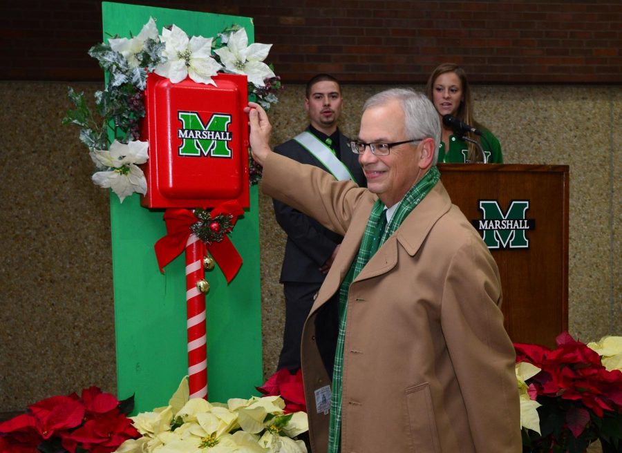 Marshall President Jerry Gilbert flips the switch to light the campus Christmas tree during the 2016 Herd Holiday celebration on the Memorial Student Center Plaza. Gilbert will flip the switch during this year’s event, as well, kicking off a celebration that aims to get faculty, staff, students and the local community in the holiday spirit.