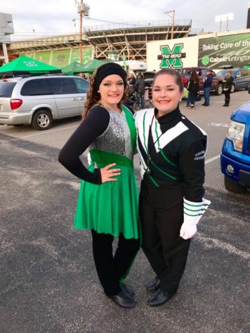 Marshall University band a family tradition for two sisters