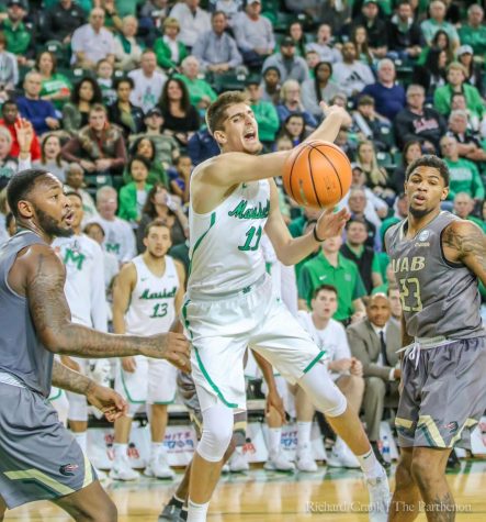 Burks, defense clinch overtime win for Marshall Men’s Basketball