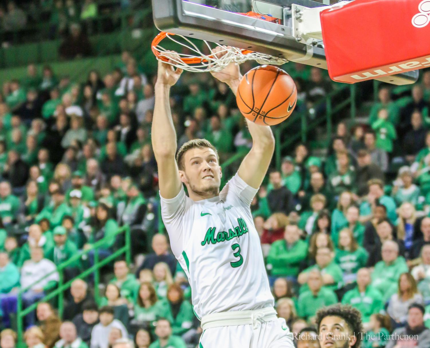 Jannson Williams, dunking against Western Kentucky University last Saturday.