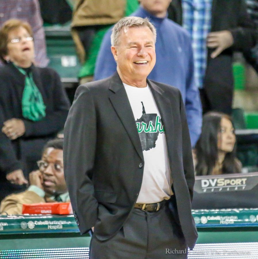Head coach Dan DAntoni smiles as time expires in the second half. The win marks his 60th as Marshalls head coach.