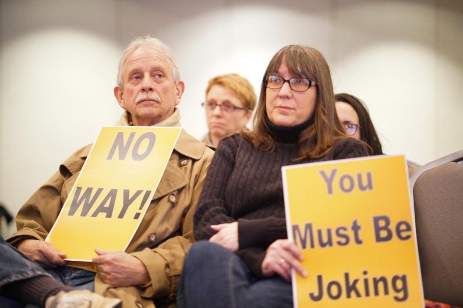 Protesters in the crowd during Blankenships town hall meeting. 
