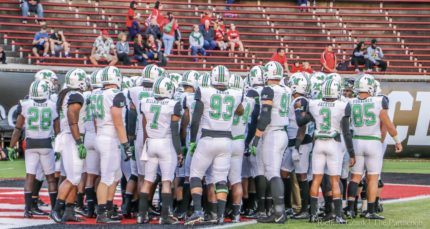 Marshall student and defensive lineman for the Thundering Herd football team Larry Aaron (93) died Thursday after complications from a bullet that injured his spine at a New Year’s Eve party in Maryland.