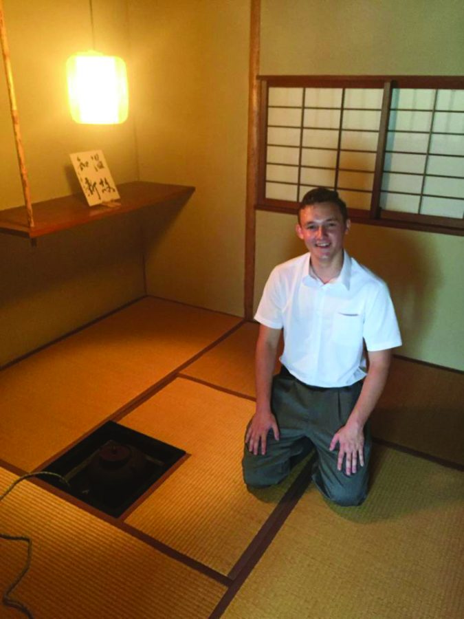 Christian Thompson in a Japanese Sado club tea house during his trip overseas in high school.
