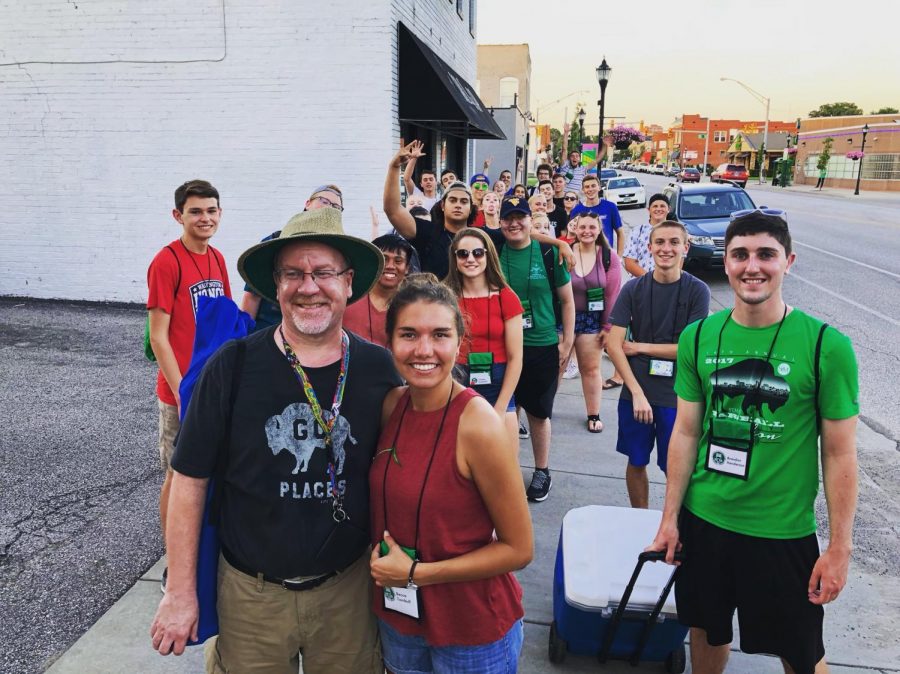 Governors Honors Academy, led by Dan Hollis and Rebecca Turnbull, walk down Fourth Avenue to the fireworks on Tuesday, July 3.