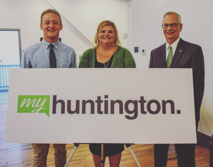 Franklin Norton, left, stands with Sarah Payne, associate vice president for external engagement at the Marshall University Research Corporation, and Marshall University president Jerry Gilbert at the My Huntington press conference on July 9.