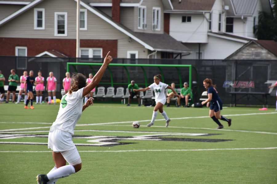 Junior forward Marah Abu-tayeh gestures for a pass from sophomore forward Canaan Booton in Marshalls home-opener against UT-Martin.  Abu-tayehs is currently tied with her sister, Farah Abu-tayeh, for a team-leading 5 goals.