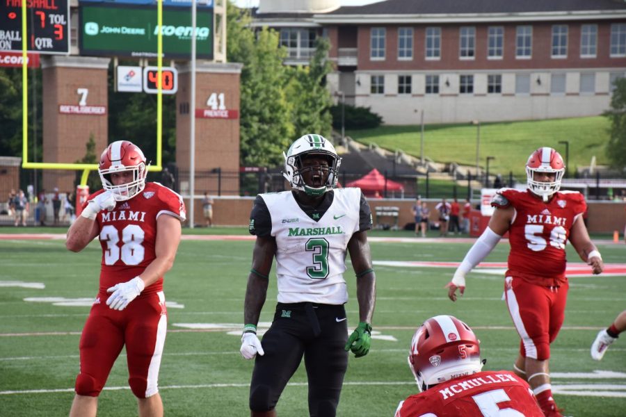 Redshirt+sophomore+running+back+Tyler+King+shows+emotion+in+the+first+quarter+of+Marshall%E2%80%99s+35-28+win+over+the+Miami+%28Ohio%29+RedHawks.+King+accumulates+67+rushing+yards%2C+32+receiving+yards+and+83+combined+returning+yards+in+the+game.