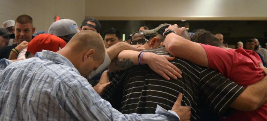 Huntington community stands together in worship, praise to help people on the road to recovery
