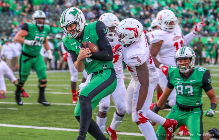 Quarterback Alex Thomson scores a rushing touchdown to seal the win against FAU for the Herd. Thomson uses his legs multiple times in Marshalls C-USA victory.