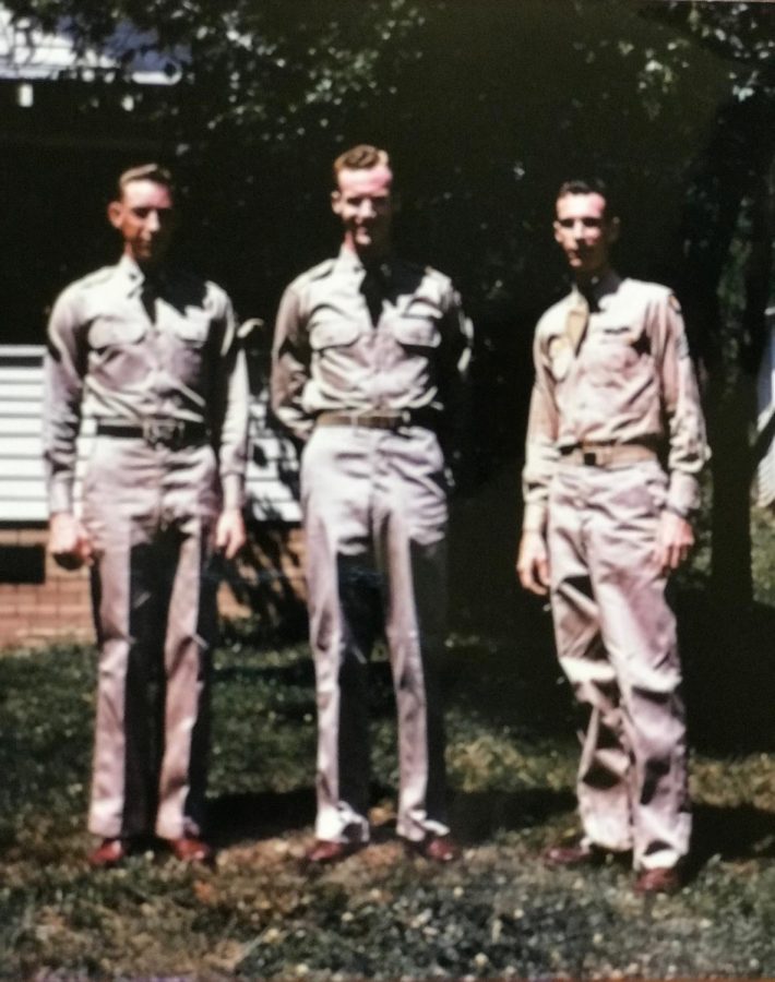 Amanda Larchs grandfather, Okey Miller, in the middle, served in Korea, with his brothers Preston and Harley Miller on his left and right. Preston served in the Army as a cryptologist, and Harley served in World War II in the Army Air Corps. 