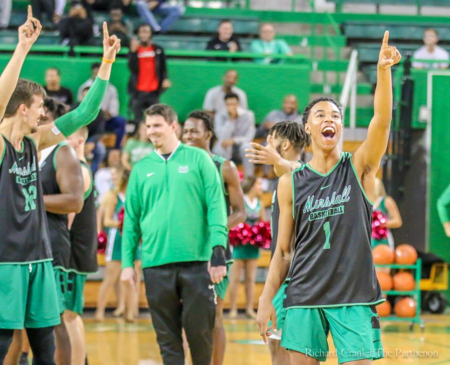 Freshman+guard%2C+Taevion+Kinsey%2C+points+in+excitement+during+%E2%80%9CHerd+Madness%E2%80%9D+at+the+Henderson+Center+prior+to+Marshall%E2%80%99s+two+preseason+games.