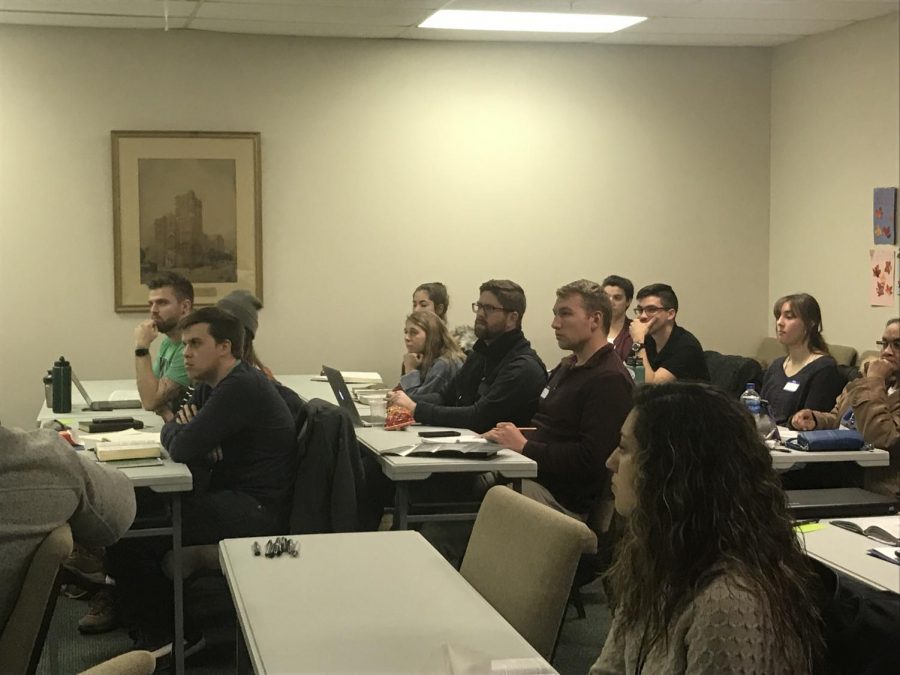 Participants of the Perspectives course listen to guest speaker, Matthew Chittum, during Thursday’s course.