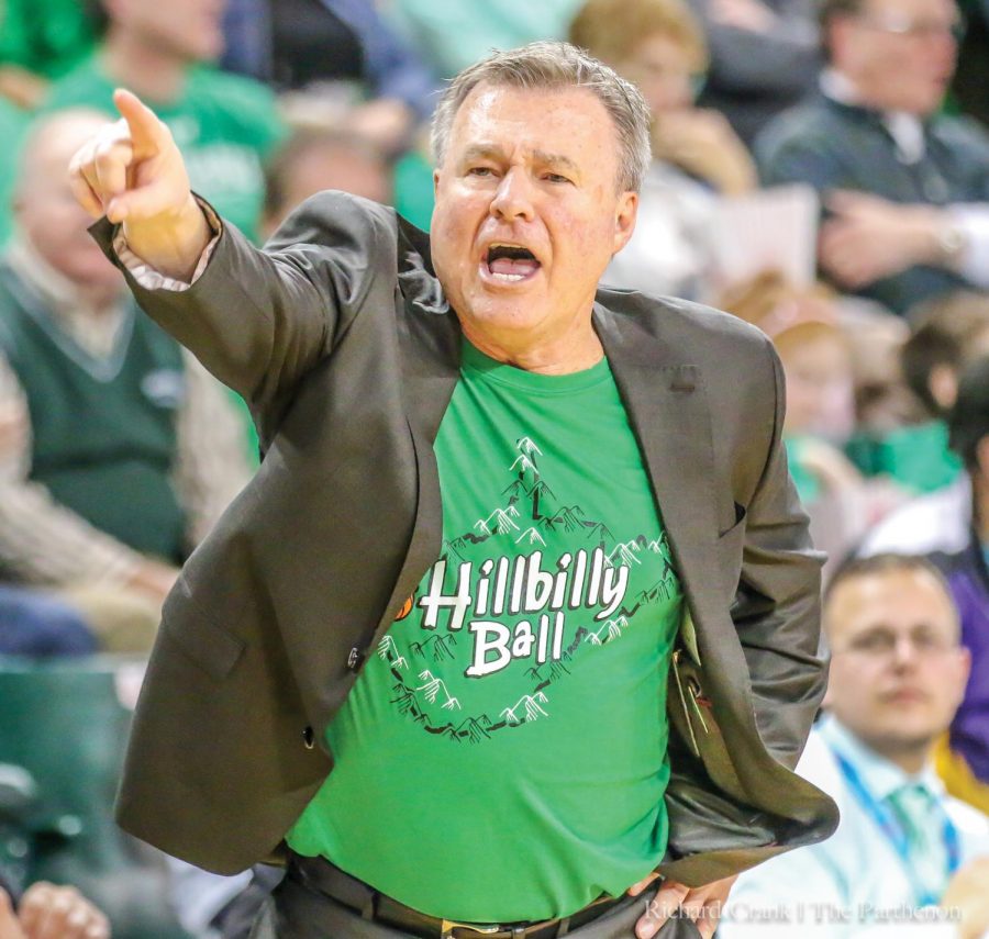 Marshall head coach Dan D’Antoni shouts instructions to his team during the Thundering Herd’s 116-106 overtime loss to UTSA.