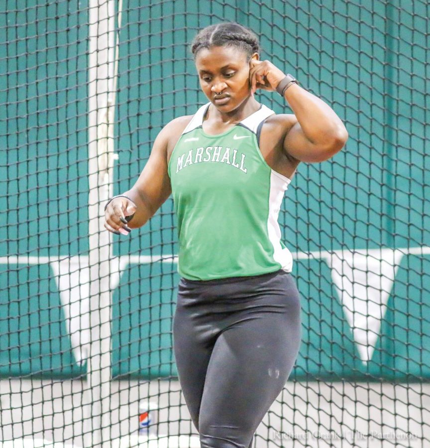 Hasana Clark prepares to participate in the weight throw at the Qdoba Marshall Invitational.