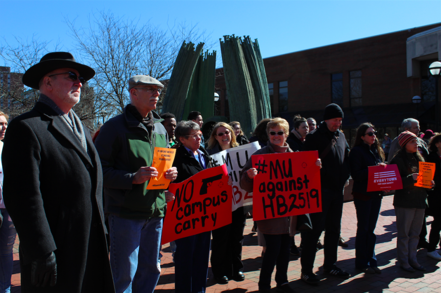 Locals gather to protest proposed campus-carry bill, Monday at Marshall Universitys Memorial Fountain.