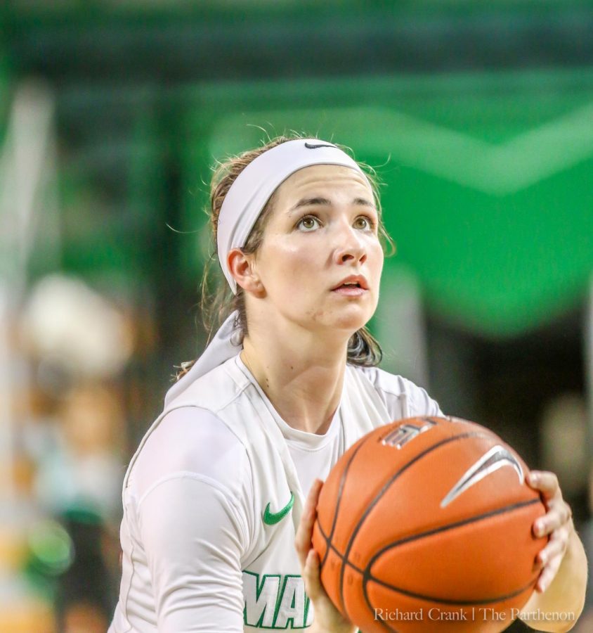 Marshall guard Taylor Porter (11) shoots a free throw during the Thundering Herds game against North Texas at the Cam Henderson Center.