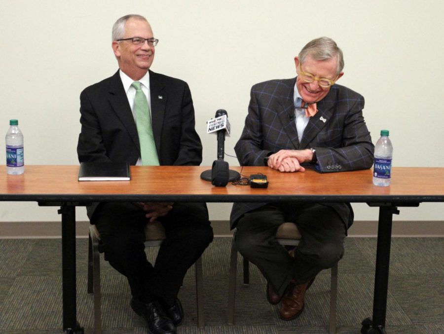 Marshall University President Jerry Gilbert, left, and West Virginia University President E. Gordon Gee speak to members of the media prior to attending a meeting with the Huntington Regional Chamber of Commerce and local elected officials, Wednesday, July 26, 2017, at St. Marys Center for Education in Huntington. 