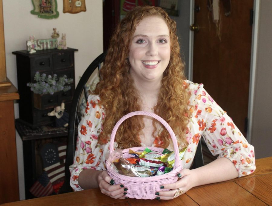 Amanda posing with her Easter basket, eager to dig in to the candy and chocolates, some of her absolute favorite things. 