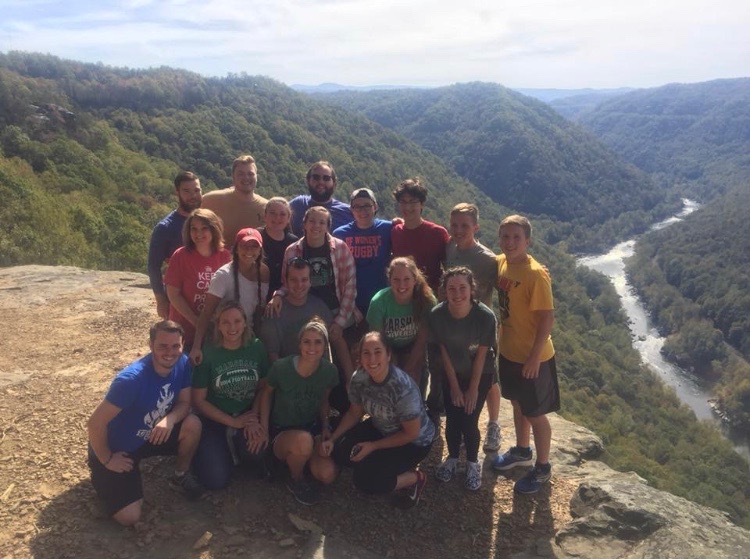 Members of the Catholic Newman Center pose for a photo during a hike at the New River Gorge.