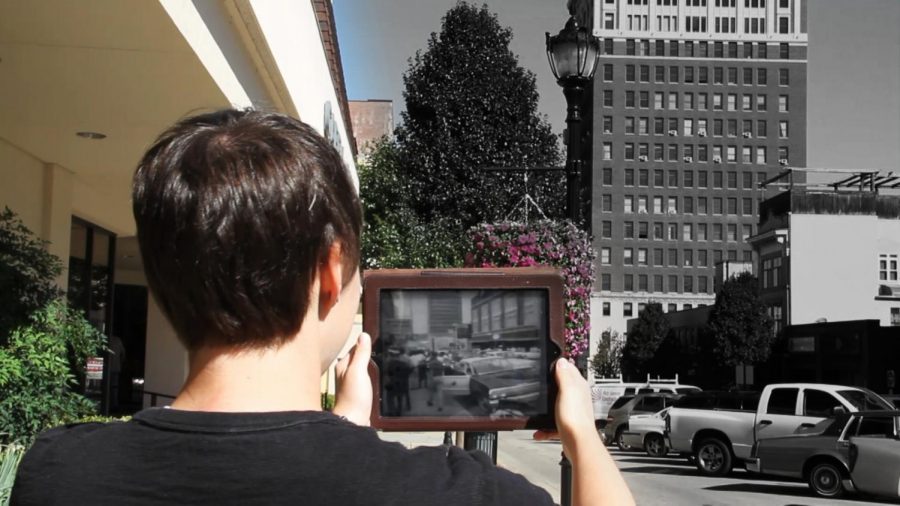 A student uses Clio in Huntington to view a historic protest on Fifth Avenue. 