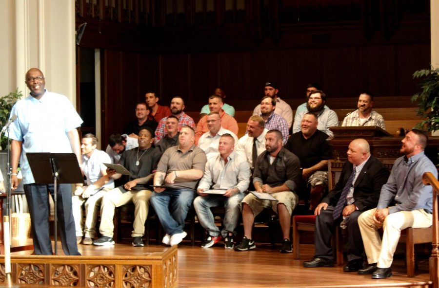 Recovery Point Huntington program director Ray McWilliams addresses crowd Thursday evening during ceremony at First Presbyterian Church.