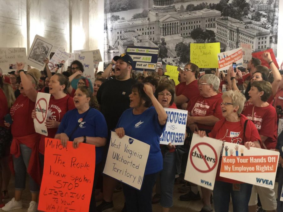 Local educators, public employees, students and concerned locals protesting and chanting against Student Success Act, Saturday, June 1, in room outside Senate chamber.