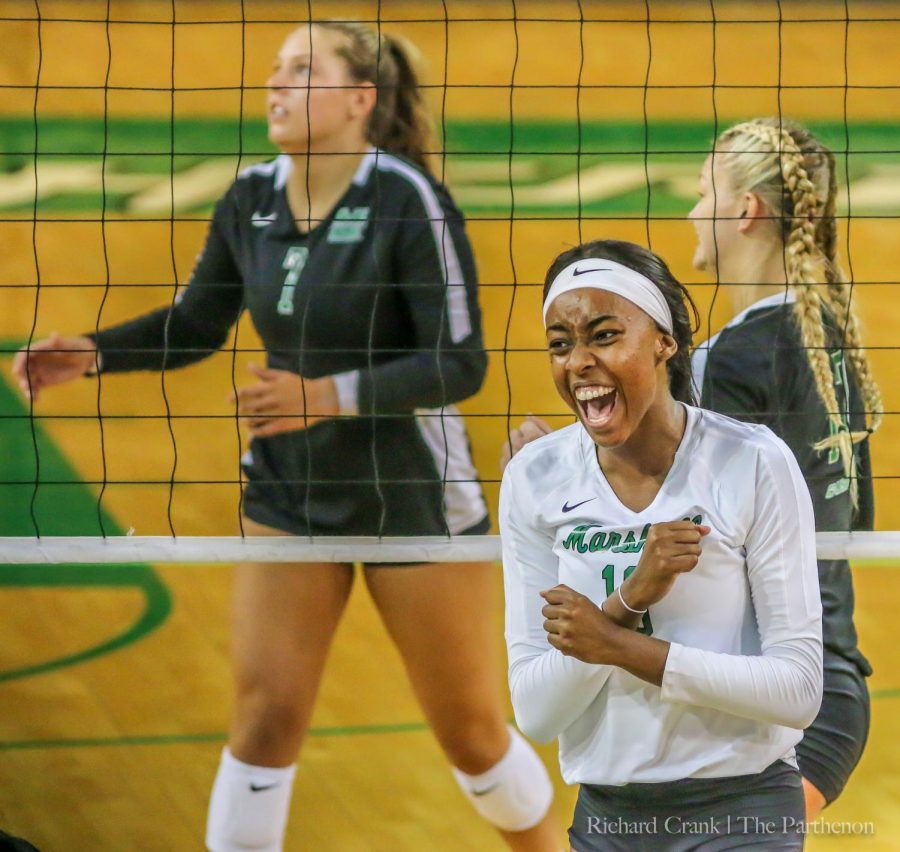 Destiny Leon celebrates a kill in the Green vs White volleyball match. 