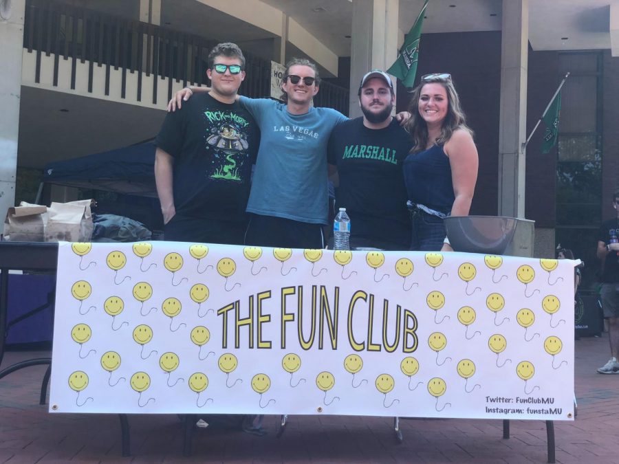 Marshall students Adam Bailey, Kane Morrone, Todd Turley and Madison Barker pose for a photo Wednesday, Sept. 11 at The Fun Club table during the university’s Student Involvement & Organization Fair on the Memorial Student Center Plaza.