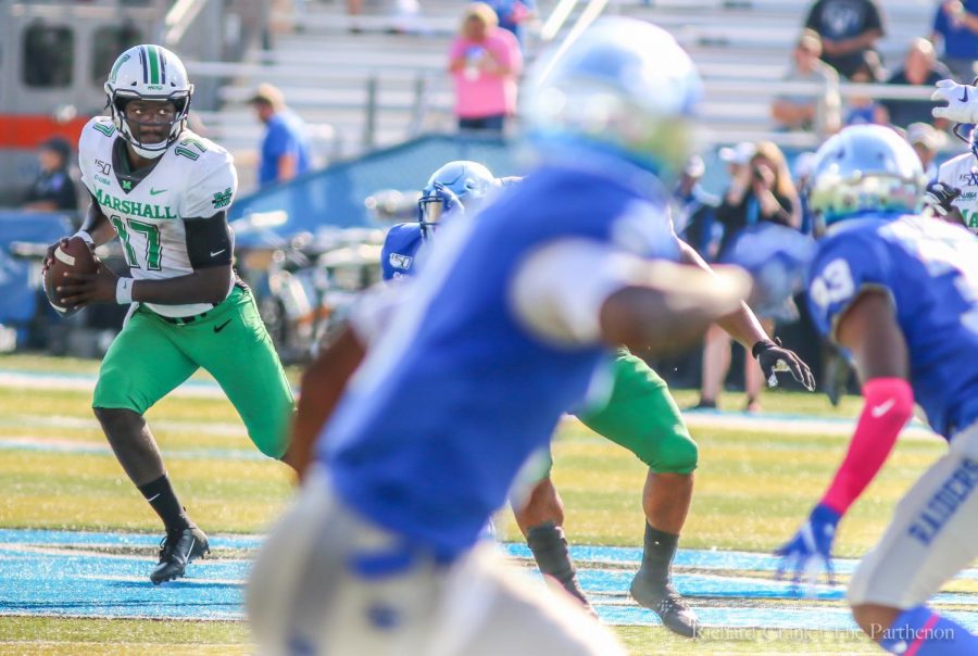 Herd quarterback Isaiah Green looks for an open receiver during Herd football game vs Middle Tennessee State University Oct. 5. 