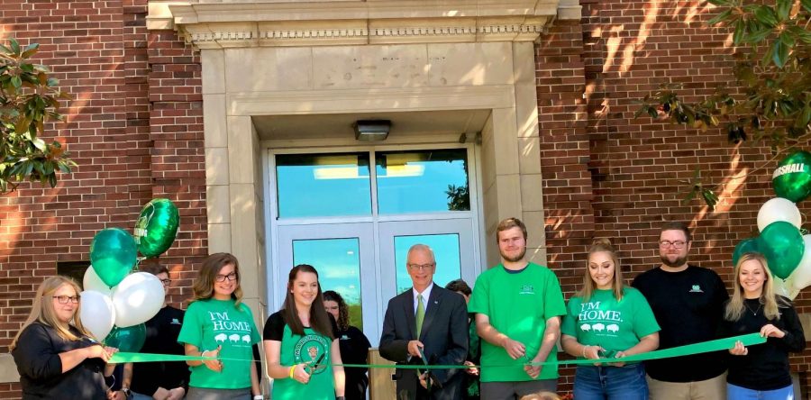 College Of Education and Professional Development students cut the ribbon to officially re-open Jenkins Hall alongside Marshall President Jerry Gilbert Oct. 4.