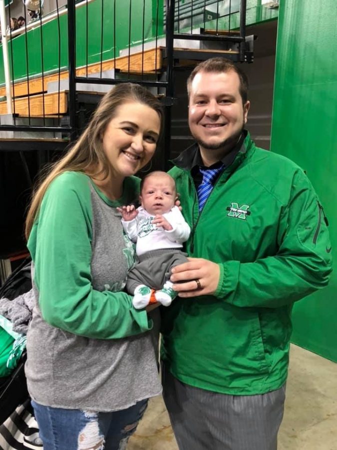 Neal and Haley Scaggs are supporting Herd mens basketball with their son, Scout.