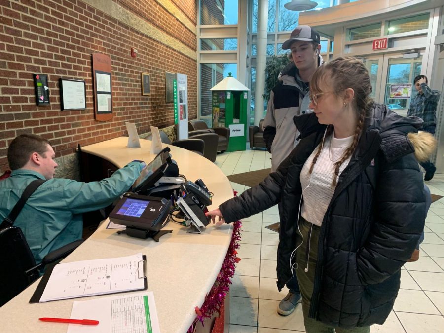 Marshall students using fingerprint technology as meal swipes at Harless Dining Hall. 