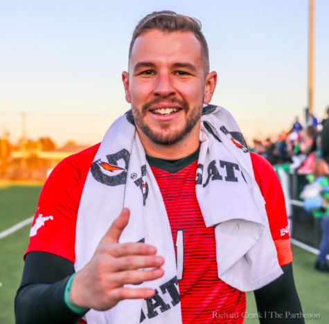 Marshall redshirt senior goalkeeper Paulo Pita celebrates the Herd's win over the University of Kentucky earlier this season.